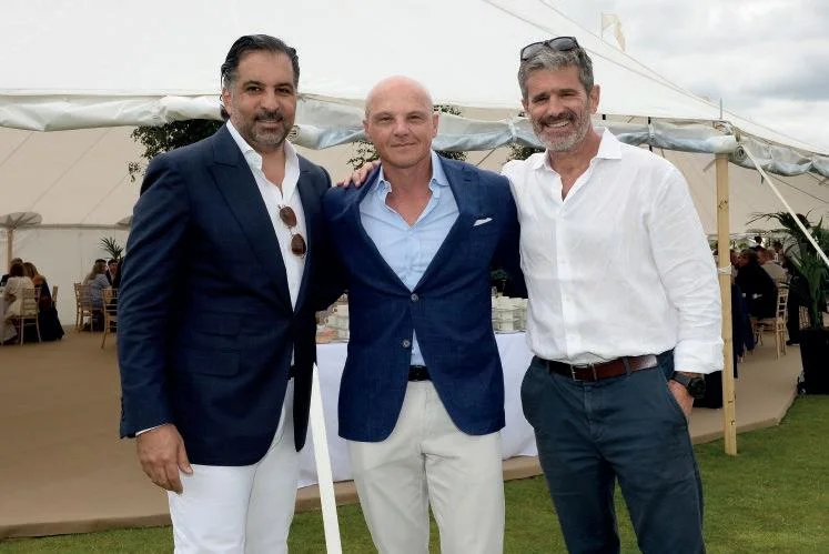 Alessandro Bazzoni junto a sus socios